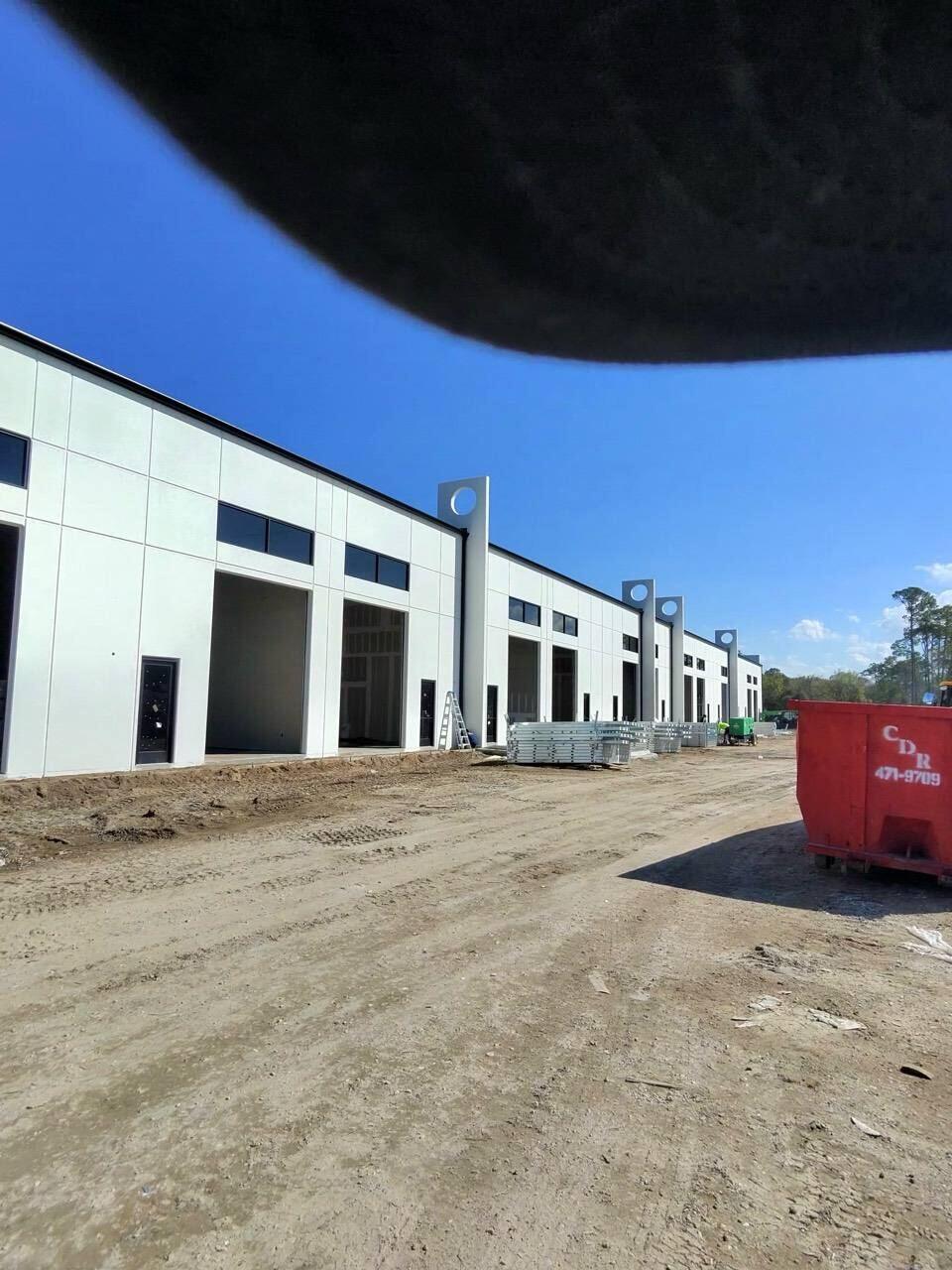Wide view of a multi-unit commercial gutter installation project